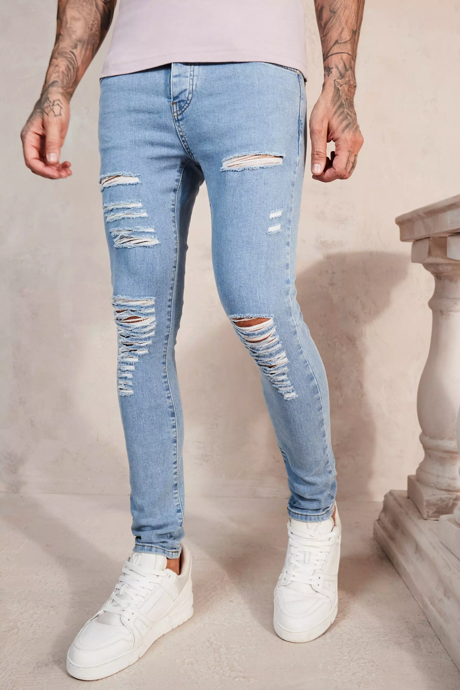 Super Skinny Jeans With All Over Rips